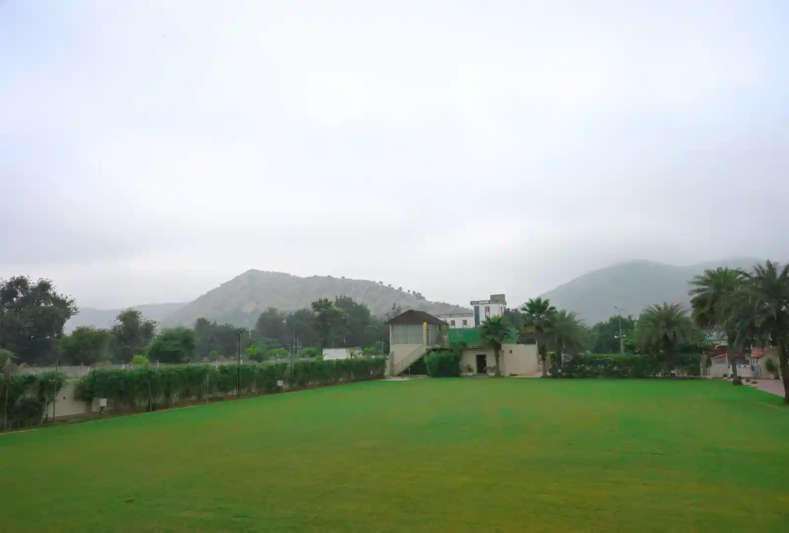 Grand Celebration & Wedding Lawn with Aravalli Backdrop - Golden Bagh Alwar